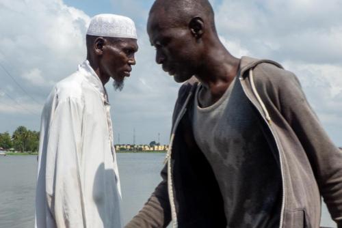 Dans les transports lagunaires se croisent tous types d'habitants, à l'image de cette métropole cosmopolite